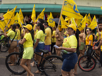 Supporters of Afua mayoral candidate Sandro Cunha walk in Afua, Para, Brazil, on September 29, 2024. (