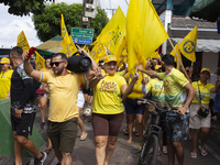 Supporters of Afua mayoral candidate Sandro Cunha walk in Afua, Para, Brazil, on September 29, 2024. (