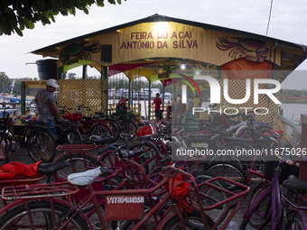 Bicycles park in front of the municipal Acai market, a fruit widely consumed in the Brazilian Amazon, also known as the black gold of the Am...