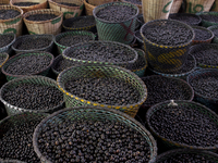 Acai fruit, known as the black gold of the Amazon, is at the municipal market in Afua, Para, Brazil, on September 30, 2024. (