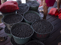 Acai fruit, known as the black gold of the Amazon, is at the municipal market in Afua, Para, Brazil, on September 30, 2024. (