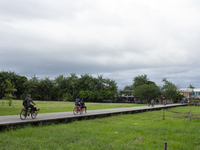 People ride bicycles in the streets of the city known as the city of bicycles, located at the mouth of the Amazon River, in Afua, Para, Braz...