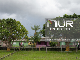 People ride bicycles in the streets of the city known as the city of bicycles, located at the mouth of the Amazon River, in Afua, Para, Braz...