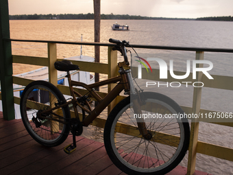 A bicycle parks at the mouth of the Amazon River in Afua, Para, Brazil, on October 1, 2024. (