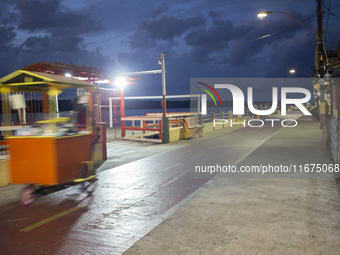 A popcorn cart is at the mouth of the Amazon River in Afua, Para, Brazil, on October 1, 2024. (