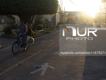 People ride bicycles in the streets of the city known as the city of bicycles, located at the mouth of the Amazon River, in Afua, Para, Braz...