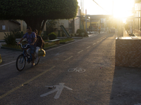 People ride bicycles in the streets of the city known as the city of bicycles, located at the mouth of the Amazon River, in Afua, Para, Braz...