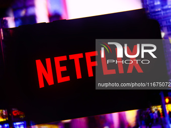 Netflix logo is screened on a mobile phone for illustration photo. Krakow, Poland on October 17th, 2024. (