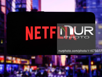 Netflix logo is screened on a mobile phone for illustration photo. Krakow, Poland on October 17th, 2024. (