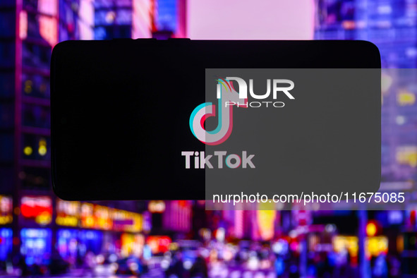 TikTok logo is screened on a mobile phone for illustration photo. Krakow, Poland on October 17th, 2024. 