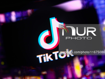 TikTok logo is screened on a mobile phone for illustration photo. Krakow, Poland on October 17th, 2024. (