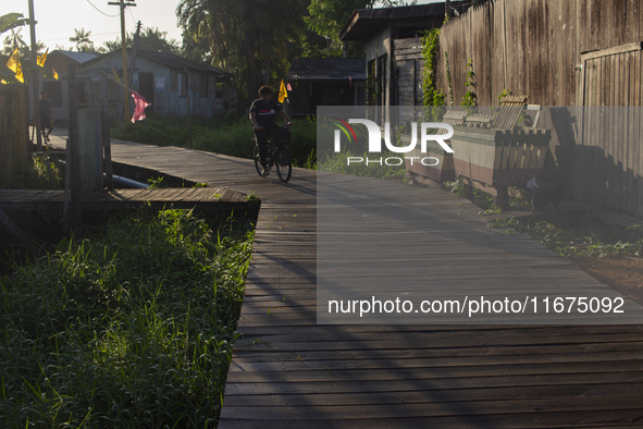 People ride bicycles in the streets of the city known as the city of bicycles, located at the mouth of the Amazon River, in Afua, Para, Braz...