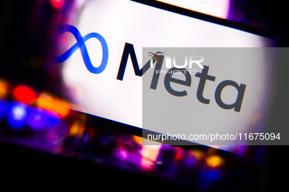 Meta logo is screened on a mobile phone for illustration photo. Krakow, Poland on October 17th, 2024. 