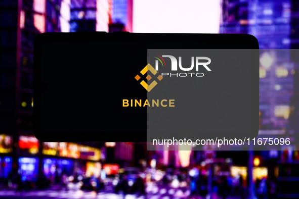 Binance logo is screened on a mobile phone for illustration photo. Krakow, Poland on October 17th, 2024. 