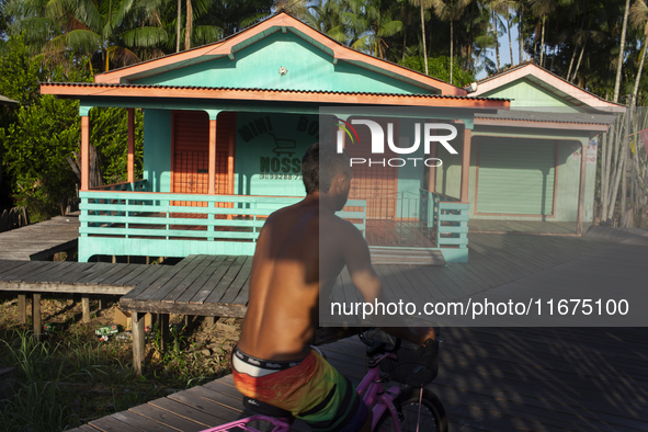 People ride bicycles in the streets of the city known as the city of bicycles, located at the mouth of the Amazon River, in Afua, Para, Braz...