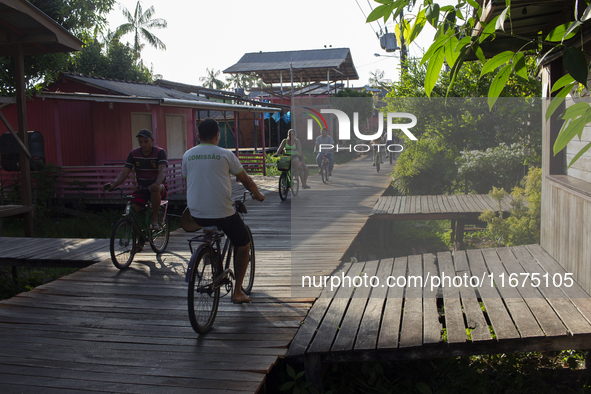 People ride bicycles in the streets of the city known as the city of bicycles, located at the mouth of the Amazon River, in Afua, Para, Braz...