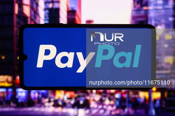 PayPal logo is screened on a mobile phone for illustration photo. Krakow, Poland on October 17th, 2024. 