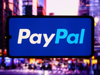 PayPal logo is screened on a mobile phone for illustration photo. Krakow, Poland on October 17th, 2024. (