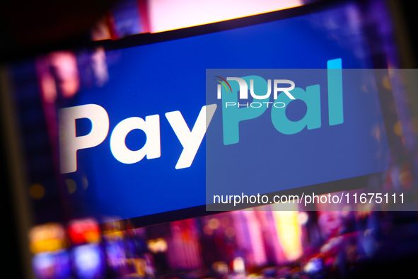 PayPal logo is screened on a mobile phone for illustration photo. Krakow, Poland on October 17th, 2024. 