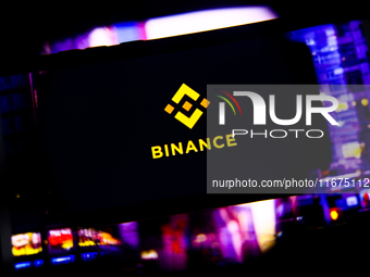 Binance logo is screened on a mobile phone for illustration photo. Krakow, Poland on October 17th, 2024. (