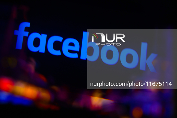 Facebook logo is screened on a mobile phone for illustration photo. Krakow, Poland on October 17th, 2024. 