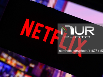 Netflix logo is screened on a mobile phone for illustration photo. Krakow, Poland on October 17th, 2024. (