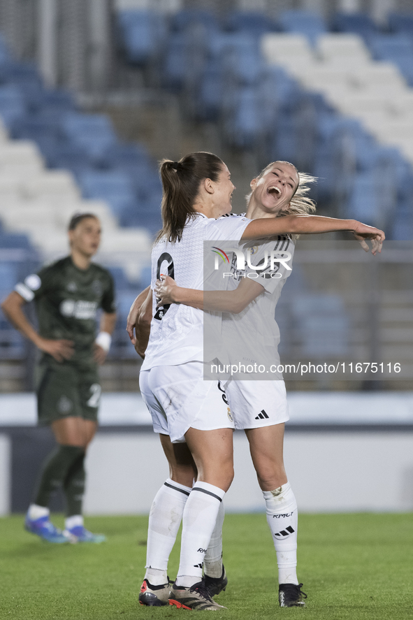 In Madrid, Spain, on October 17, Signe Bruun and Melanie Leupolz of Real Madrid women celebrate a goal during the UEFA Women's Champions Lea...