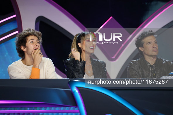 Juanpa Zurita, Anahi Puente, and Miguel Angel Fox speak during a press conference to promote the launch of ?Quien es La Mascara? season 6 at...