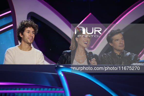 Juanpa Zurita, Anahi Puente, and Miguel Angel Fox speak during a press conference to promote the launch of ?Quien es La Mascara? season 6 at...