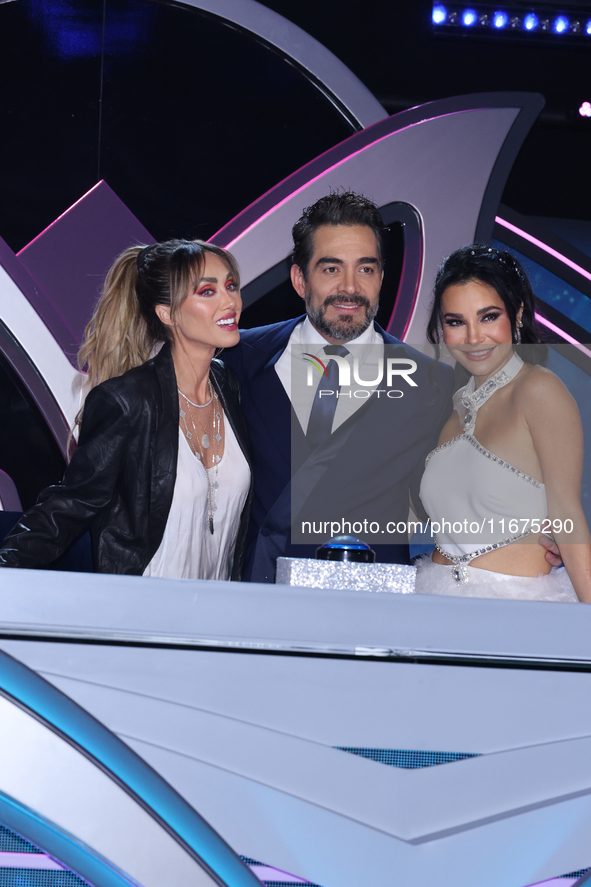 (L-R) Anahi Puente, Omar Chaparro, and Martha Higareda pose for photos during a press conference to promote the launch of ?Quien es La Masca...