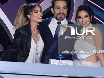 (L-R) Anahi Puente, Omar Chaparro, and Martha Higareda pose for photos during a press conference to promote the launch of ?Quien es La Masca...