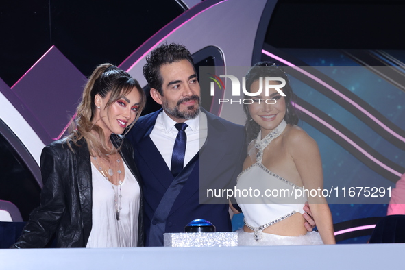 (L-R) Anahi Puente, Omar Chaparro, and Martha Higareda pose for photos during a press conference to promote the launch of ?Quien es La Masca...