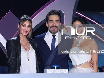 (L-R) Anahi Puente, Omar Chaparro, and Martha Higareda pose for photos during a press conference to promote the launch of ?Quien es La Masca...