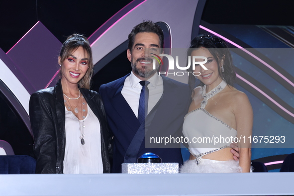 (L-R) Anahi Puente, Omar Chaparro, and Martha Higareda pose for photos during a press conference to promote the launch of ?Quien es La Masca...