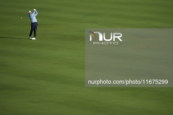 Ewen Ferguson of Scotland plays his second shot on the 14th hole on day one of the Estrella Damm N.A. Andalucia Masters 2024 at Real Club de...