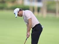 Rasmus Hojgaard of Denmark plays a shot on the 14th green on day one of the Estrella Damm N.A. Andalucia Masters 2024 at Real Club de Golf S...