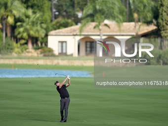 Matt Wallace of England plays his second shot on the 14th hole on day one of the Estrella Damm N.A. Andalucia Masters 2024 at Real Club de G...