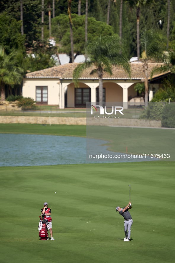 Paul Waring of England plays his second shot on the 14th hole on day one of the Estrella Damm N.A. Andalucia Masters 2024 at Real Club de Go...