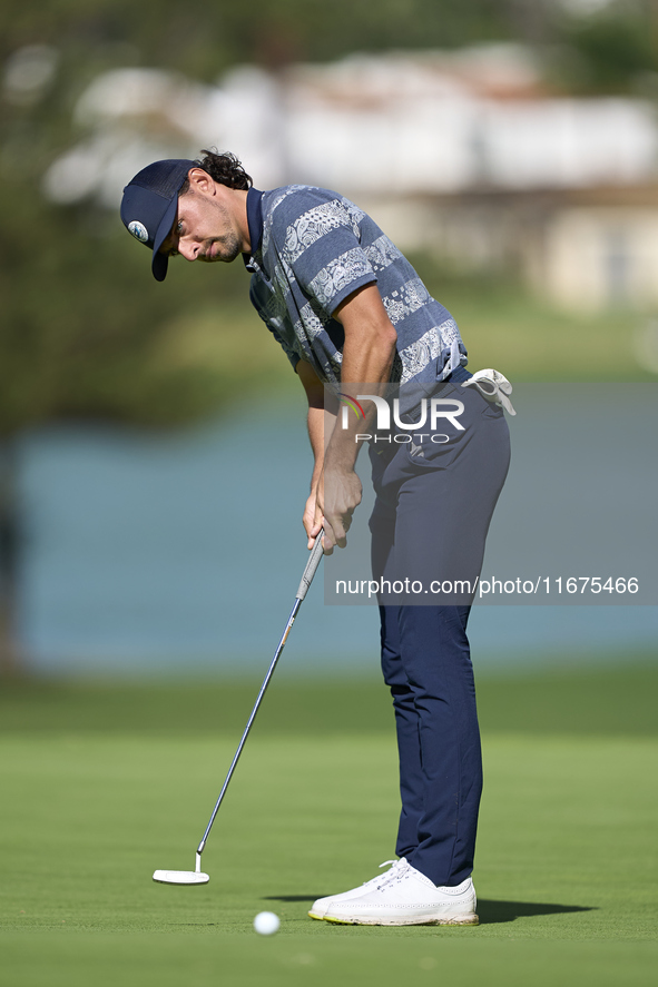 Marco Penge of England plays his shot on the 14th green on day one of the Estrella Damm N.A. Andalucia Masters 2024 at Real Club de Golf Sot...