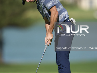 Marco Penge of England plays his shot on the 14th green on day one of the Estrella Damm N.A. Andalucia Masters 2024 at Real Club de Golf Sot...