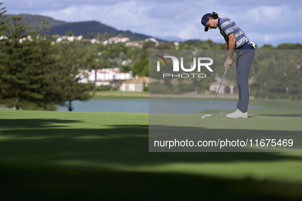 Marco Penge of England plays his shot on the 14th green on day one of the Estrella Damm N.A. Andalucia Masters 2024 at Real Club de Golf Sot...