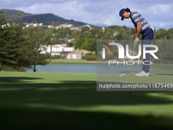 Marco Penge of England plays his shot on the 14th green on day one of the Estrella Damm N.A. Andalucia Masters 2024 at Real Club de Golf Sot...