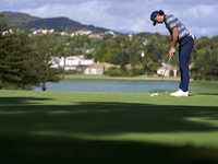 Marco Penge of England plays his shot on the 14th green on day one of the Estrella Damm N.A. Andalucia Masters 2024 at Real Club de Golf Sot...