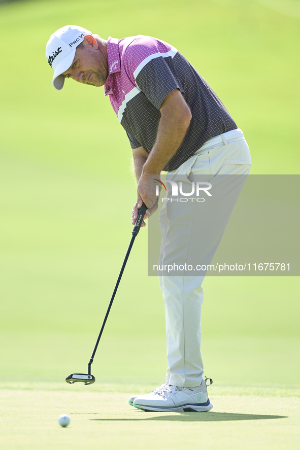 Darren Fichardt of South Africa plays a shot on the 16th green on day one of the Estrella Damm N.A. Andalucia Masters 2024 at Real Club de G...