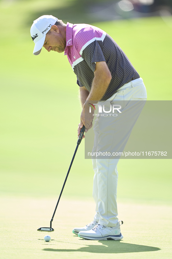 Darren Fichardt of South Africa plays a shot on the 16th green on day one of the Estrella Damm N.A. Andalucia Masters 2024 at Real Club de G...