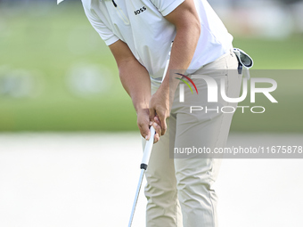 Gavin Green of Malaysia plays a shot on the 16th green on day one of the Estrella Damm N.A. Andalucia Masters 2024 at Real Club de Golf Soto...