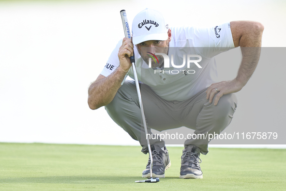 Oliver Wilson of England studies his shot on the 16th green on day one of the Estrella Damm N.A. Andalucia Masters 2024 at Real Club de Golf...