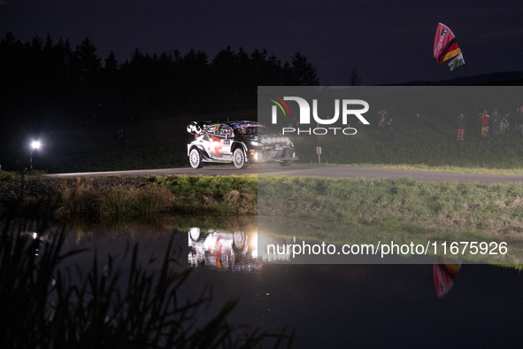 Driver Sebastien Ogier and co-driver Vincent Landais of the team Toyota Gazoo Racing WRT, with their Toyota GR Yaris Rally1 Hybrid, face the...