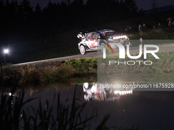 Driver Sebastien Ogier and co-driver Vincent Landais of the team Toyota Gazoo Racing WRT, with their Toyota GR Yaris Rally1 Hybrid, face the...