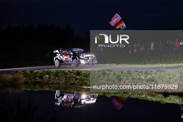 Driver Elfyn Evans and co-driver Scott Martin of the team Toyota Gazoo Racing WRT, in a Toyota GR Yaris Rally1 Hybrid, face the first day of...